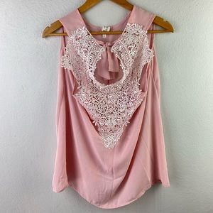 Nella Fantasía pale pink lace blouse